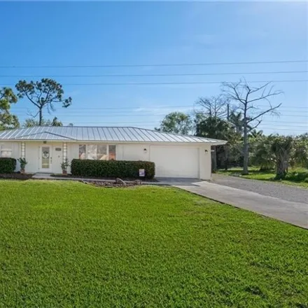 Buy this 2 bed house on 20623 Pine Tree Lane in Estero River Heights, Lee County