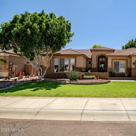 Buy this 4 bed house on 7167 West Trails Drive in Glendale, AZ 85308