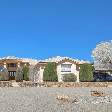 Buy this 3 bed house on 9313 Wilshire Avenue Northeast in Albuquerque, NM 87122