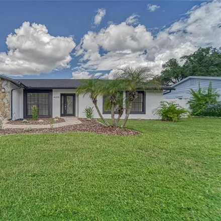 Buy this 4 bed house on 4316 Hollowhill Drive in Hillsborough County, FL 33624