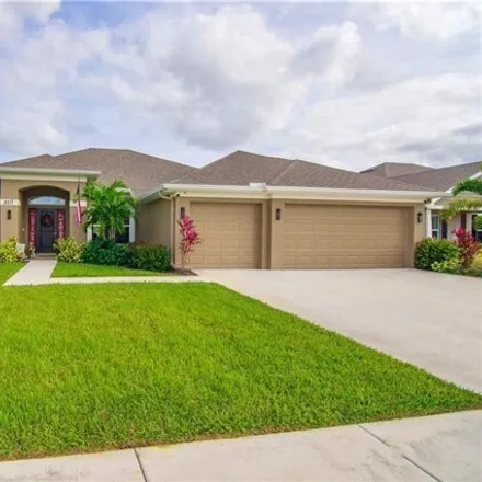 Rent this 4 bed house on 8519 Waterstone Boulevard in Lakewood Park, FL 34951