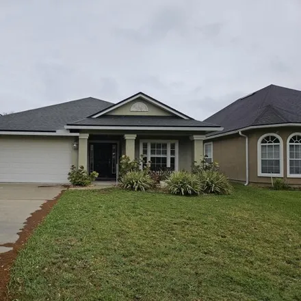 Rent this 4 bed house on ringneck Drive in Jacksonville, FL 32226