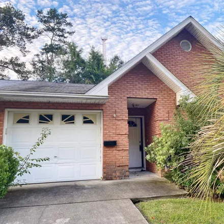 Buy this 3 bed townhouse on 3505 Chatelaine Court in Tallahassee, FL 32308