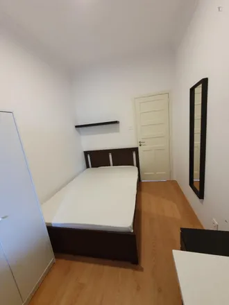 Rent this 7 bed room on Avenida de Roma in 1000-262 Lisbon, Portugal