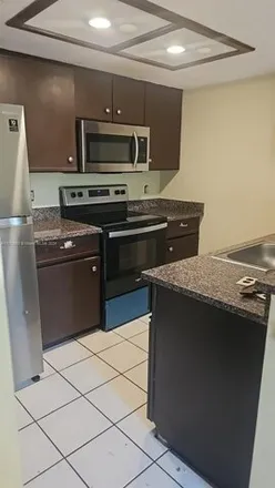 Rent this 2 bed condo on 3201 Coral Lake Drive in Coral Springs, FL 33065