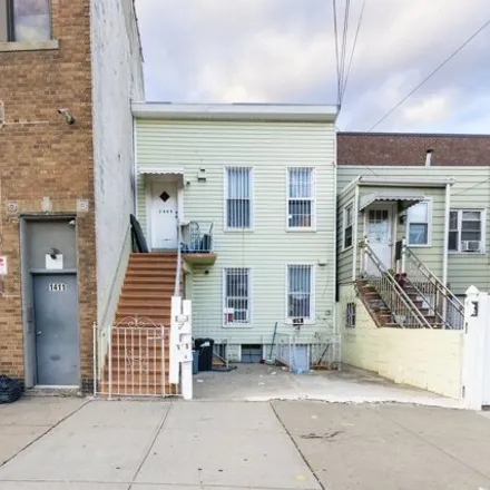 Buy this 4 bed house on 1409 Neptune Avenue in New York, NY 11224