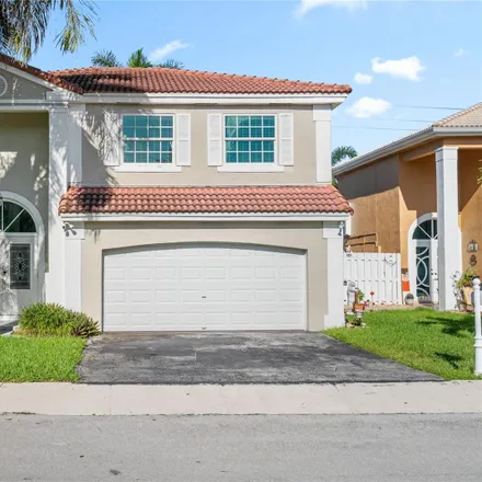 Buy this 4 bed house on 611 Royal Palm Way in Davie, FL 33325