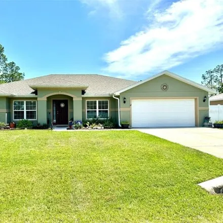 Buy this 4 bed house on 69 Kankakee Trl in Palm Coast, Florida