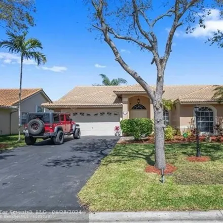 Buy this 4 bed house on 10013 Northwest 47th Street in Coral Springs, FL 33076