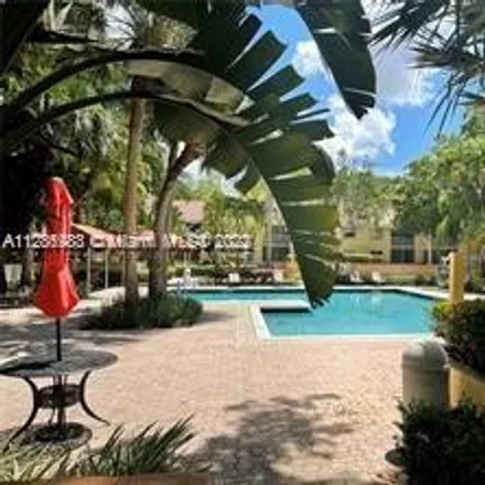 Rent this 2 bed condo on 979 Coral Club Drive in Coral Springs, FL 33071