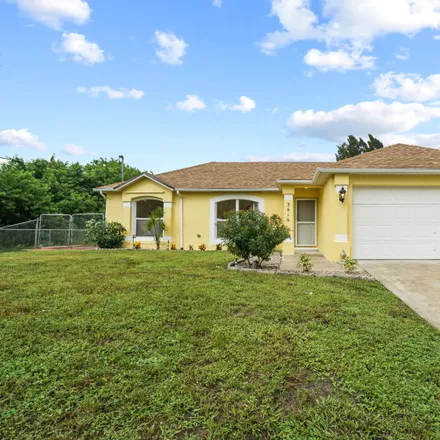 Rent this 3 bed house on 3616 Southwest Hale Street in Port Saint Lucie, FL 34953