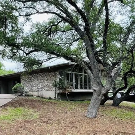 Rent this 4 bed house on 6201 Mountainclimb Drive in Austin, TX 78731