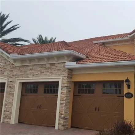 Rent this 3 bed townhouse on 8808 Della Scala Cir in Orlando, Florida