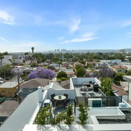 Rent this 3 bed apartment on 4899 Saturn Street in Los Angeles, CA 90019