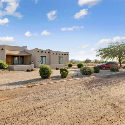 Buy this 4 bed house on 2071 West Desert Hills Drive in Maricopa County, AZ 85086