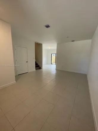 Rent this 3 bed townhouse on 26831 Southwest 119th Court in Naranja, Miami-Dade County