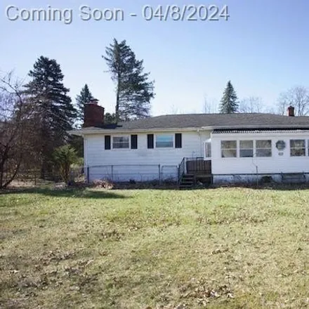 Buy this 3 bed house on 4380 Cross Road in White Lake Charter Township, MI 48386