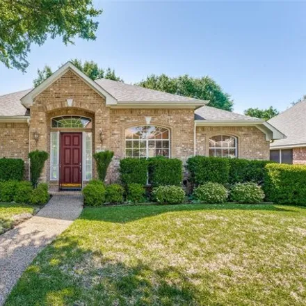 Buy this 4 bed house on 5662 Harbor Town Drive in Garland, TX 75044