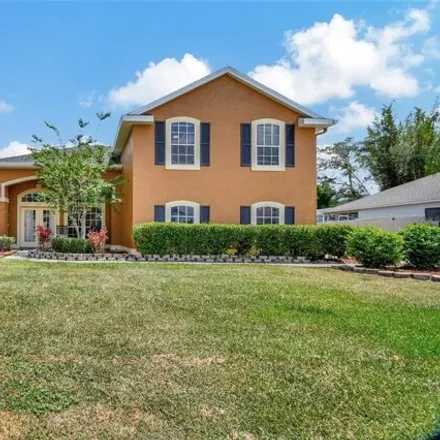 Buy this 4 bed house on 654 Copper Beech Blvd in Deltona, Florida