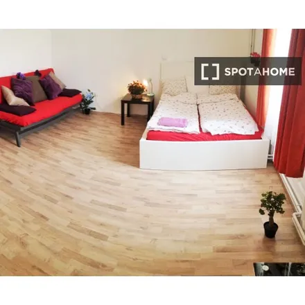 Rent this 7 bed room on Andersen Pub-1 in Budapest, Krúdy Gyula utca 17-19