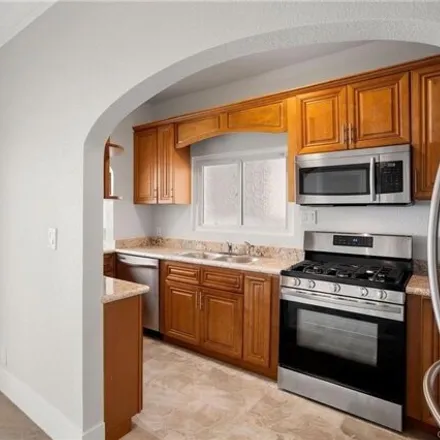 Rent this 3 bed condo on 77 South 11th Place in Long Beach, CA 90802