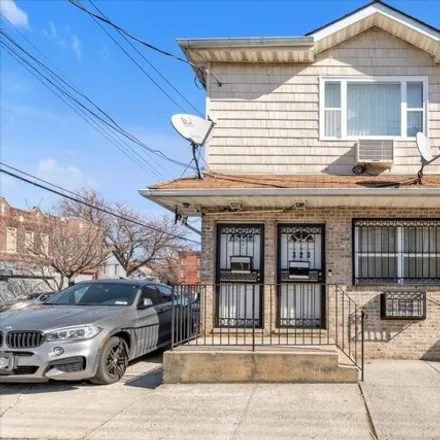 Buy this 7 bed house on 560 Glenmore Avenue in New York, NY 11207