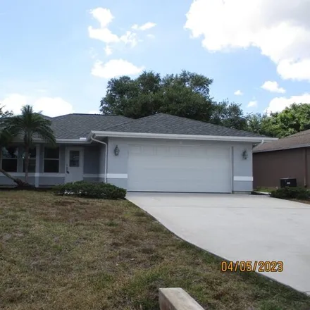Rent this 3 bed house on 1896 SW Cameo Blvd in Port Saint Lucie, Florida