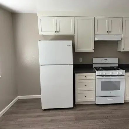 Rent this 2 bed apartment on 427 W Elm St Apt 6 in Lodi, California