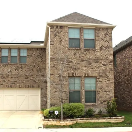 Rent this 4 bed house on Woodson Street in Irving, TX 75063