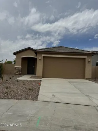 Rent this 3 bed house on North Acacia Drive in Pinal County, AZ