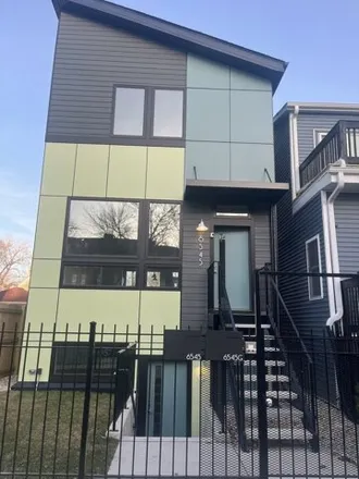 Rent this 2 bed house on 6547 South Langley Avenue in Chicago, IL 60637