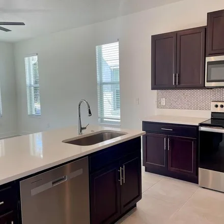Rent this 3 bed apartment on 2959 West Cherry Street in Belvedere Acres, Tampa