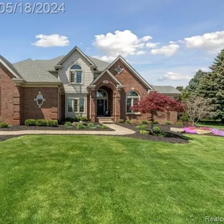 Buy this 4 bed house on 1298 Saint Andrews in Highland Charter Township, MI 48357