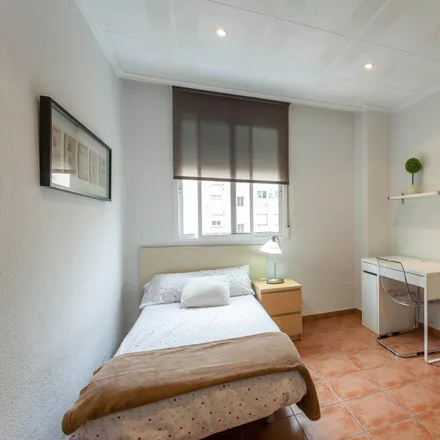 Rent this 4 bed room on Carrer del Poeta Andrés Cabrelles in 46022 Valencia, Spain