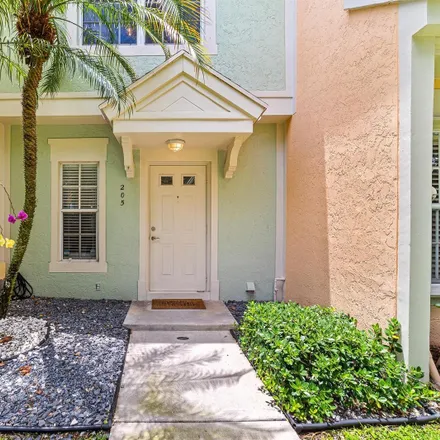 Rent this 2 bed townhouse on 205 Mallory Court in Weston, FL 33326