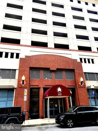Rent this 3 bed condo on Water Street Garage in Custom House Avenue, Baltimore