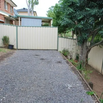 Rent this 3 bed townhouse on Glenfield Road in Casula NSW 2170, Australia