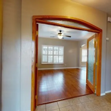 Rent this 4 bed apartment on 3412 Del Agua Court Northeast in Holiday Park, Albuquerque