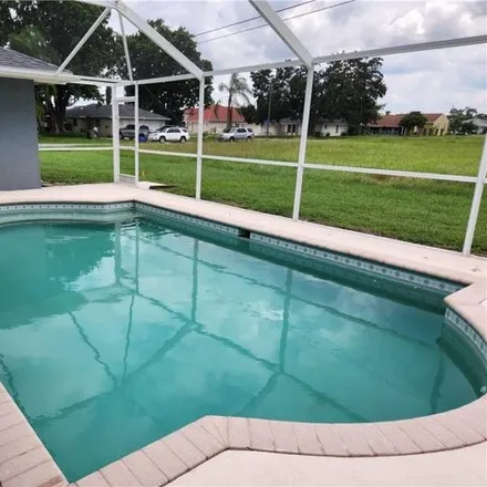 Rent this 4 bed house on Kingston Street in Lehigh Acres, FL 33974