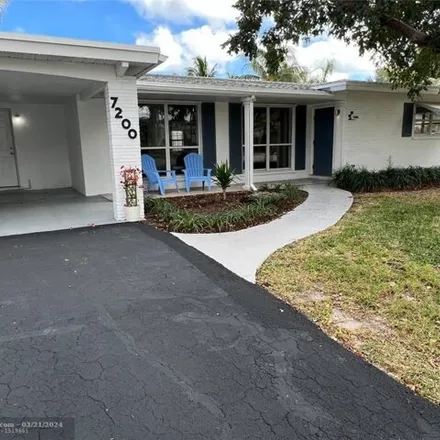 Rent this 3 bed house on 7218 Northeast 8th Avenue in Boca Harbour, Boca Raton
