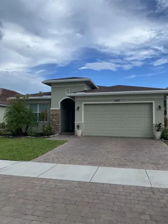 Rent this 3 bed house on 1401 Northwest Leonard Circle in Port Saint Lucie, FL 34986