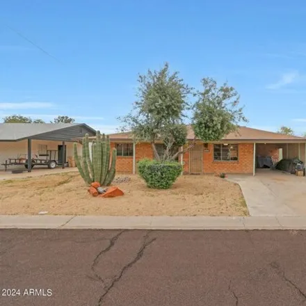 Buy this 3 bed house on 5031 West Gardenia Avenue in Glendale, AZ 85301