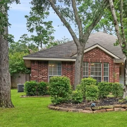Rent this 3 bed house on 23 Teakwood Pl in The Woodlands, Texas