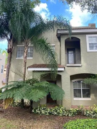 Rent this 3 bed townhouse on Atkins Place in Orlando, FL 32804