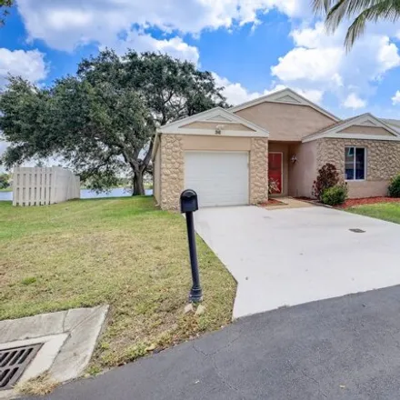 Buy this 3 bed house on 98 Buxton Lane in Boynton Beach, FL 33426