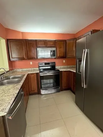 Rent this 2 bed condo on 447 Northeast 210th Circlecle Terrace in Andover Lakes Estates, Miami-Dade County