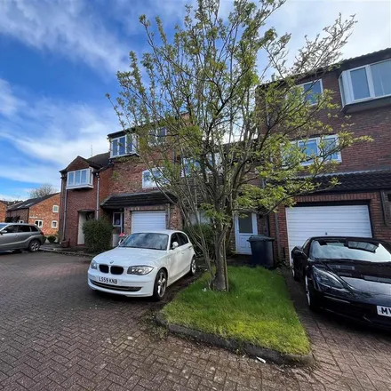 Rent this 3 bed townhouse on 11 Kensington Court in Wilmslow, SK9 5DA