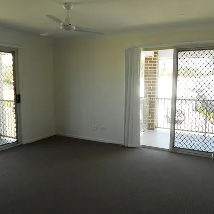 Rent this 4 bed townhouse on Cygnus Crescent in Coomera QLD 4209, Australia