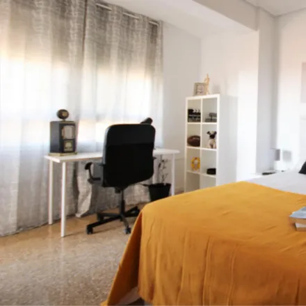 Rent this 4 bed room on Carrer de Campoamor in 46021 Valencia, Spain