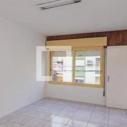 Buy this 2 bed apartment on Edifício Sinuelo in Rua Flores da Cunha, Centro